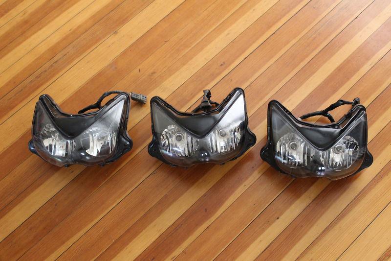 04-05 trx450r headlight brand new take off's - never used- trx 450r headlight