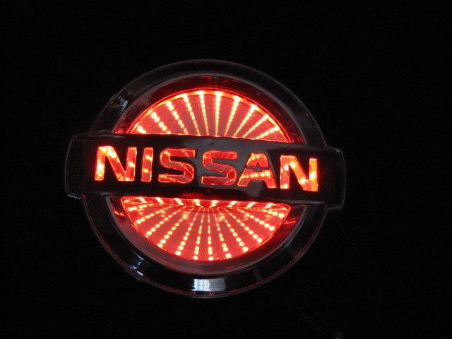 New nissan livina 3d led light up   logo badge emblem decal red 11.7cm*10.0cm  