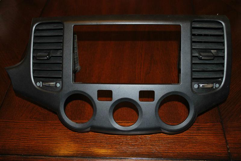 2006-2008 kia optima radio trim panal 