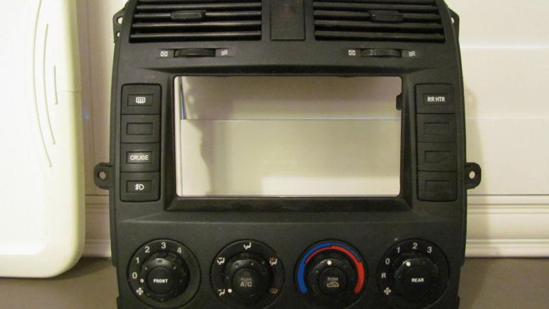 03 kia sedona radio bezel with ac temp switch 