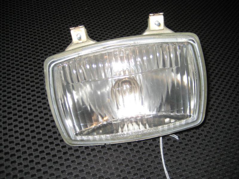 Yamaha 225 dx headlight assembly