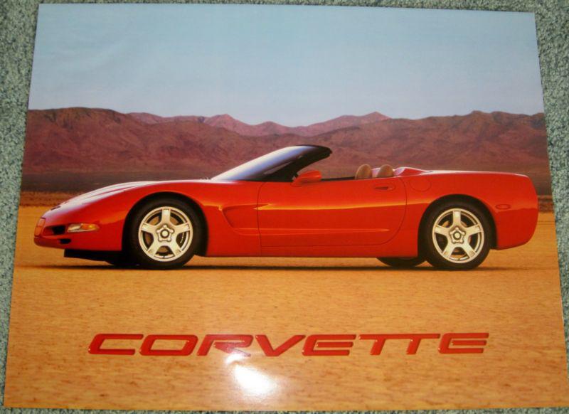 1998 chevrolet corvette poster 17"x22" front=red convertible. back= five photos 