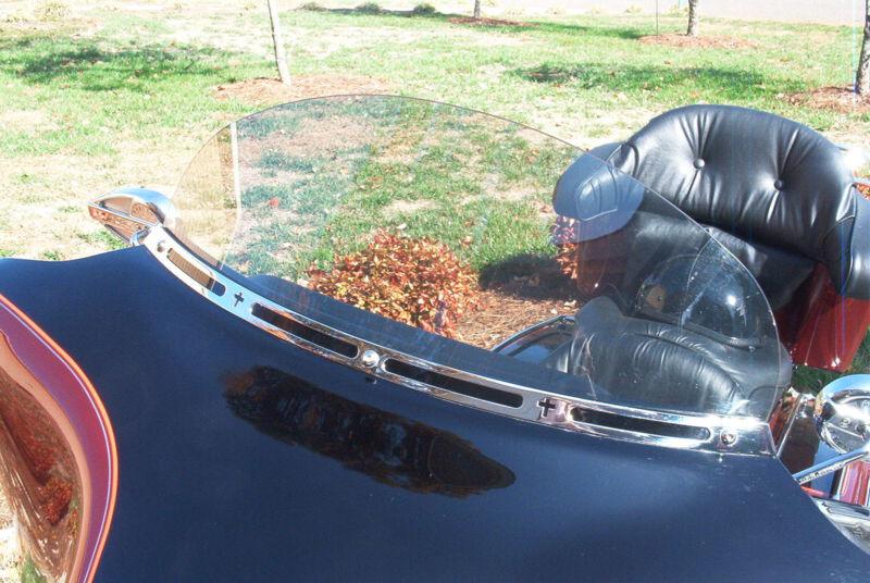 Harley  windshield trim-spirit cross fits 96-12 (polished s.s.)