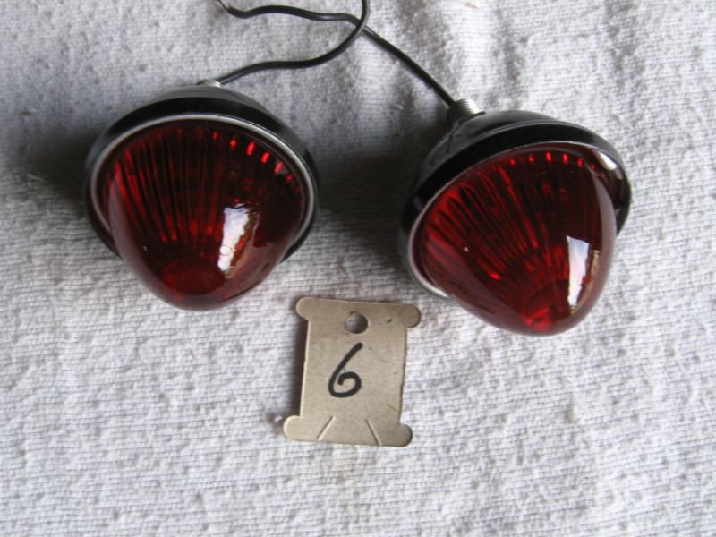 2 red glass  cone shape tail  lights or clearance lights