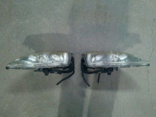 92 93 94 95 grand am  headlight set assembly rh lh 1 gm cheap 