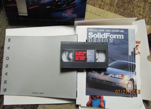 1999 pontiac grand am sales kit with vcr vhs tape and heavy binder brochure