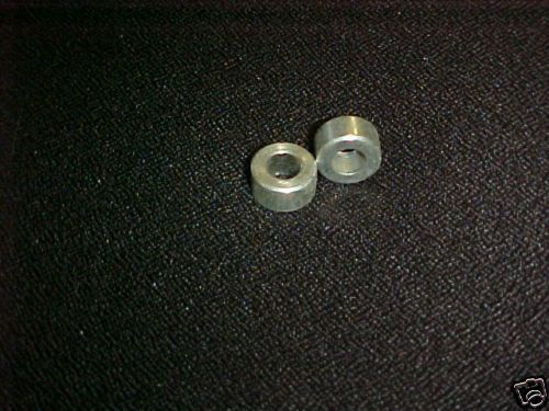 Harley,sportster,2 oem nos rear gas tank spacers