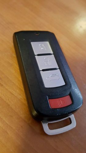 Mitsubishi lancer outlander smart key fob remote  used genuine authentic oem