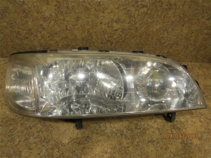 96-98 acura 2.5tl 3.2tl passenger side right rh r oem stanley headlight assembly