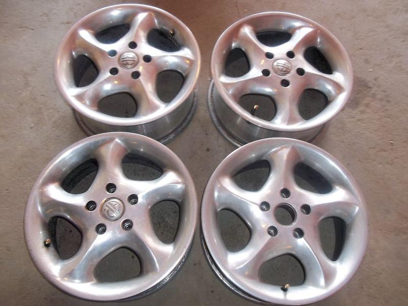 Four 16" alloy rims / 115 mm / fits most gm & chrysler front wheel drive models