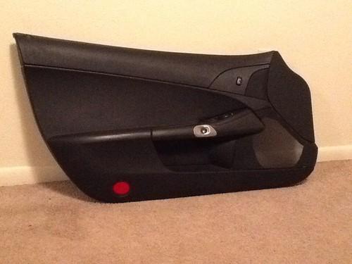 2005-2012 c6 corvette driver side door panel with all buttons &controls..