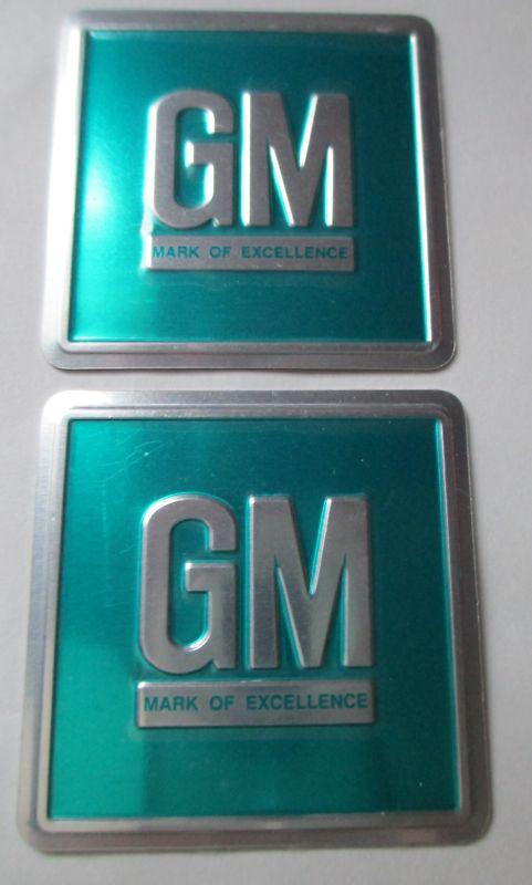 Chevrolet turquoise "gm mark of excellence" door label decals (set of 2)