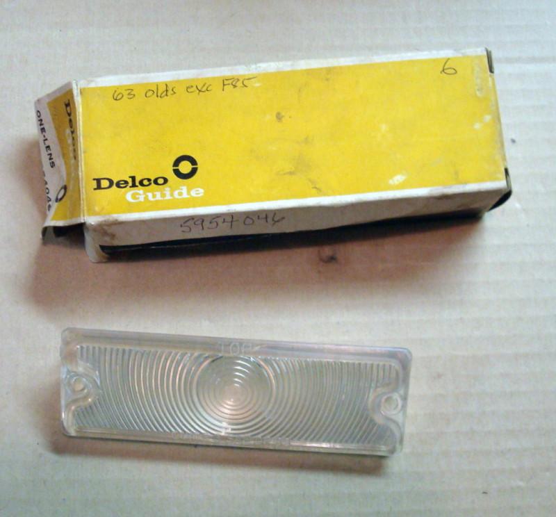 Nos 1963 oldsmobile parking light lens