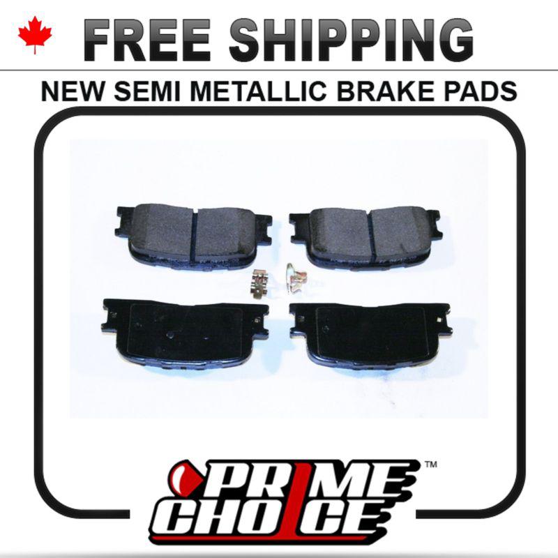 New premium complete set of rear metallic disc brake pads with shims