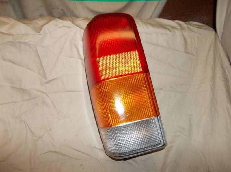 97 98 99 00 01 jeep cherokee xj drivers side left tail, stop light