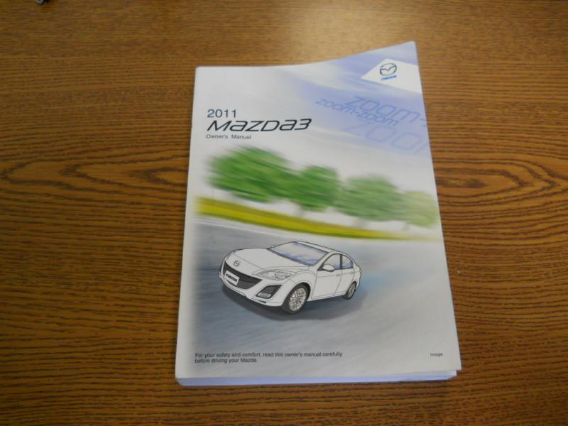 11 2011 mazda 3 three owners manual  **actual photos/see other photos**