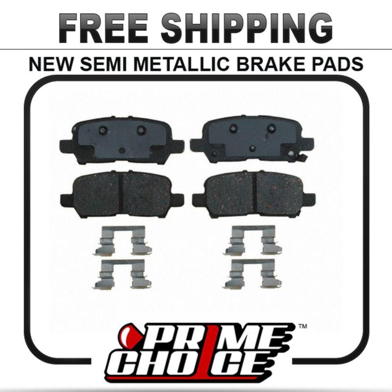 New premium complete set of rear metallic disc brake pads with shims