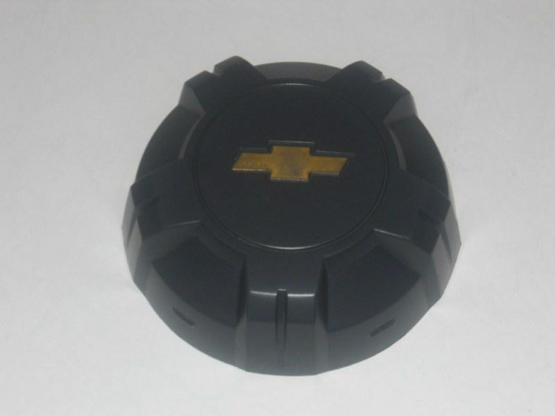 Chevy colorado,wheel center cap,hup cap,from 2004 to 2009,grey,excellent cond.