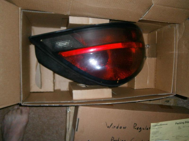 Depo 336-1912l as pontiac grand am driver side replacement tail light assembly 