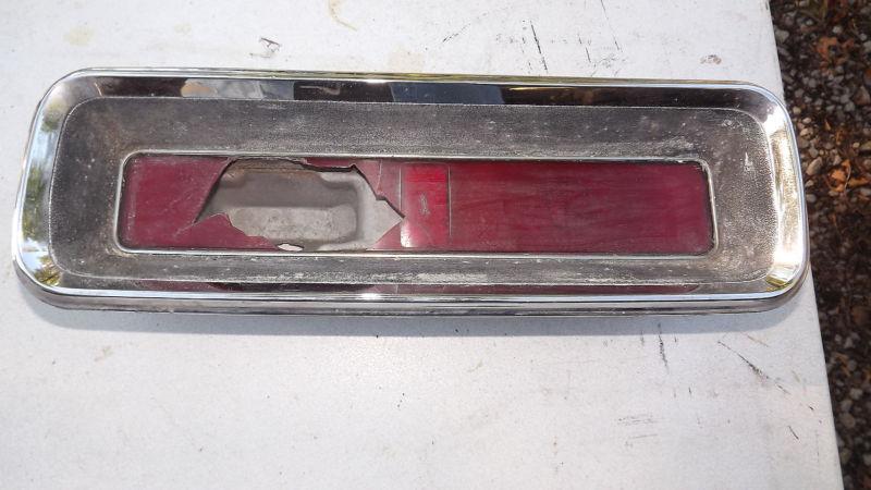 1967 camaro rs left tail lamp bezel & h0using