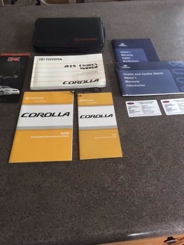 2008 toyota corolla owners manual with black toyota factory case.