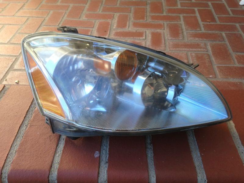 02 03 04 nissan altima right (passenger side) headlight oem, factory