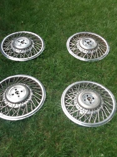 Cadillac sedan deville hubcaps 1988