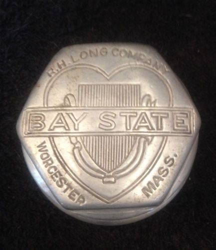 Vintage bay state r.h. long co. automotive gas cap(?) hub cap(?)