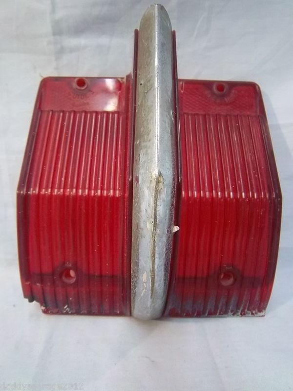 63 olds 88. oem tail light lens