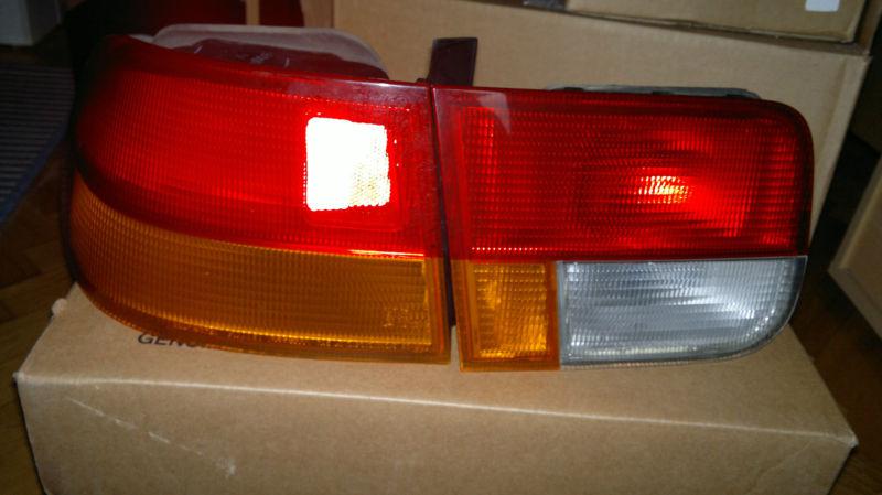 Honda civic coupe 2dr 96-00 oem tail rear light left side