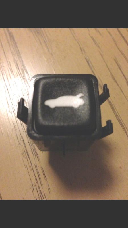 2000-2005 chevy impala monte carlo trunk release button. works