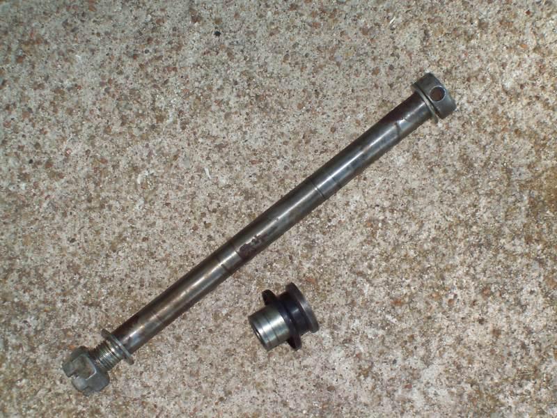 80 yamaha  exciter front wheel axle with spacer & nut