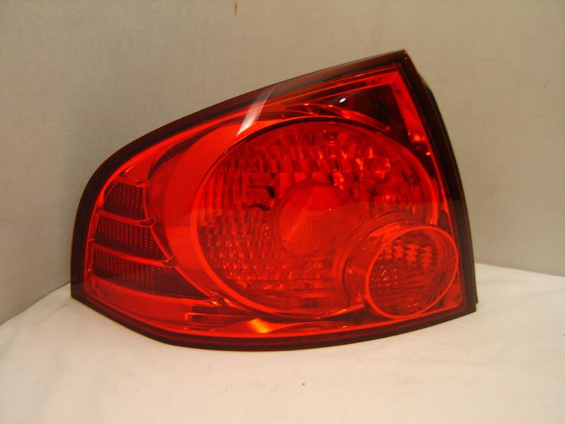 Nissan sentra left tail light 04 05 06 oem