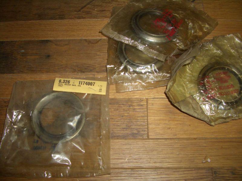 1957 buick nos front bearing oil seals set of 4