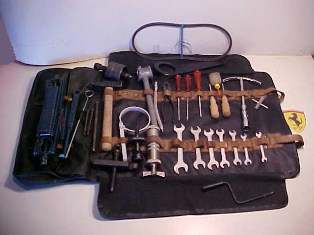 Ferrari 275 tool kit_roll bag_horn oil bottle_battaini jack_hub pullers_plier oe