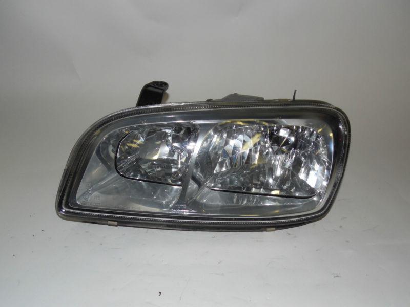 98 99 00 toyota rav4 oem left headlight nice !  