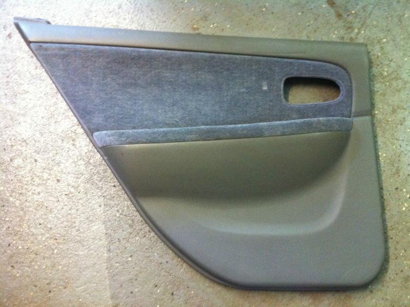 2004 kia optima rear drivers side door panel (used)