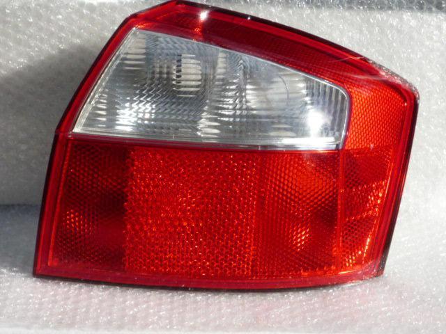 Taillight (lens & housing) assembly 100% genuine audi product passenger's side r