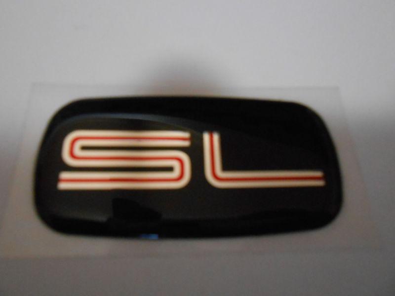 Chevrolet gmc sl body side emblem new oem