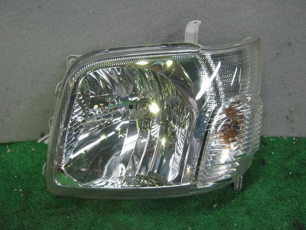 Daihatsu hijet 2005 left head light assembly [3410900]