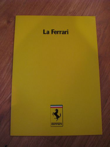 La ferrari~yellow folders two separate print numbers &amp; one tour folder-red