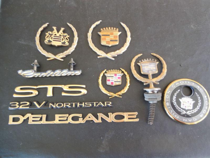 Gold cadillac emblems & hood ornaments - 12 pieces