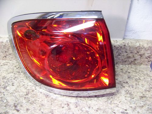 Buick enclave 2008-2012 left/driver side oem tail light part #25954941