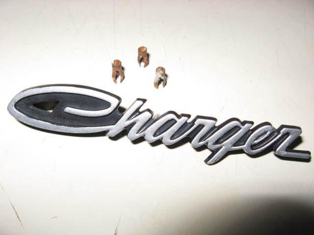 71 72 73 74 mopar b body charger dash emblem original with clips  nice