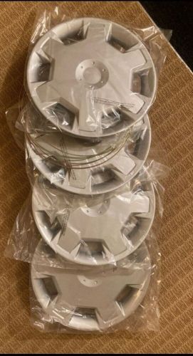 Set of four 15&#034; silver hubcap wheel covers for 2007-2009 nissan versa (push-on)