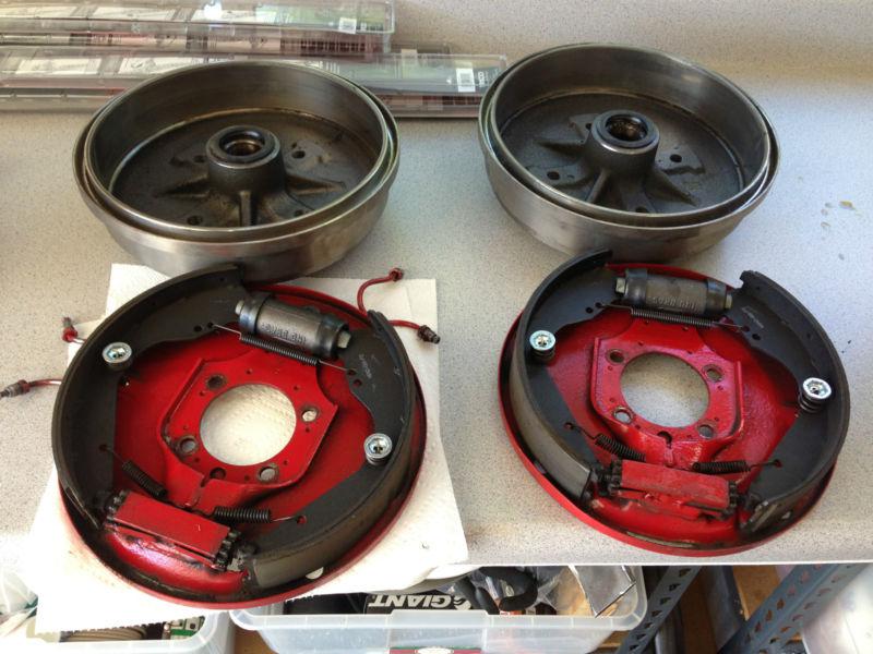 Front brake drums, bearings, backing plates, and brake shoes