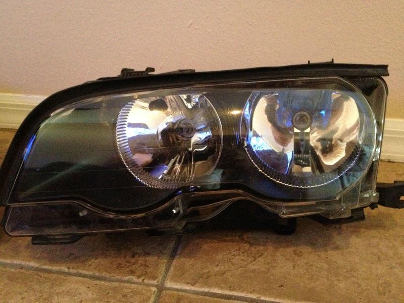 Used bmw oem headlight (left)