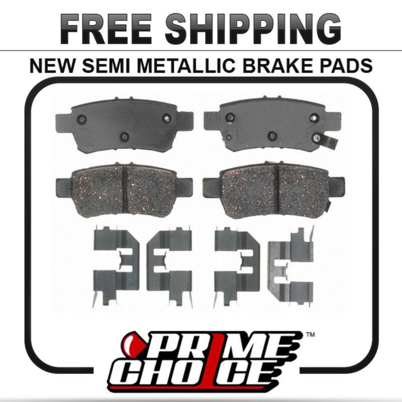 New premium complete set of rear metallic disc brake pads with shims