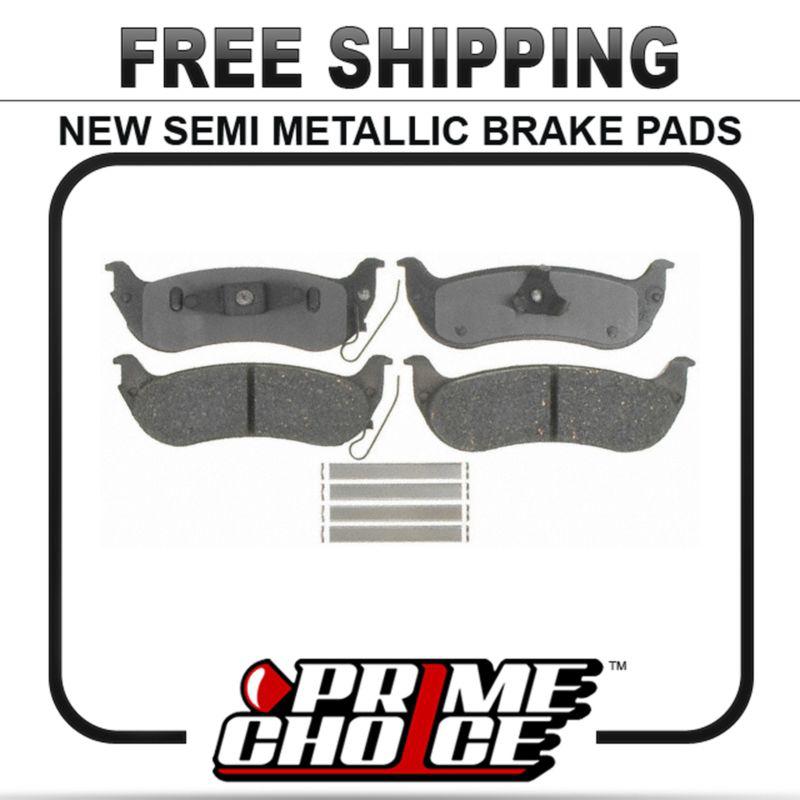 New premium complete set of rear metallic disc brake pads with shims