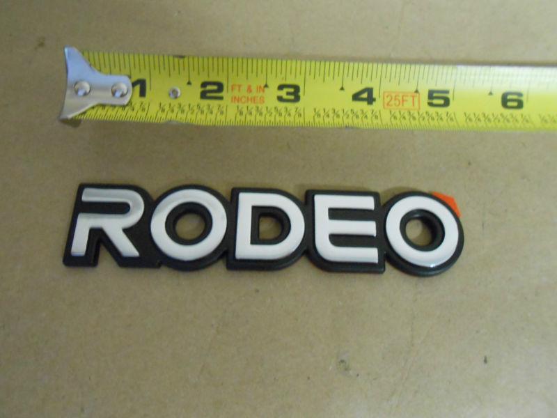 1991,92,93,94,95,96,97 rodeo emblem used oem retaped ready to install free ship